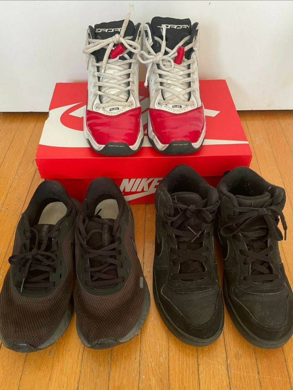 three pairs of Nike mid-top sneakers, size 5.5-6Y